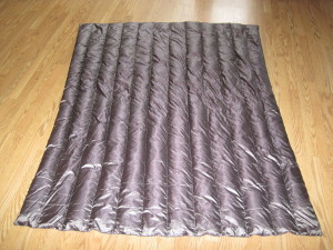 Second blanket with ripped seams.