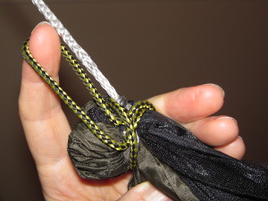 Attach quilt to hammock with a simple slip knot.